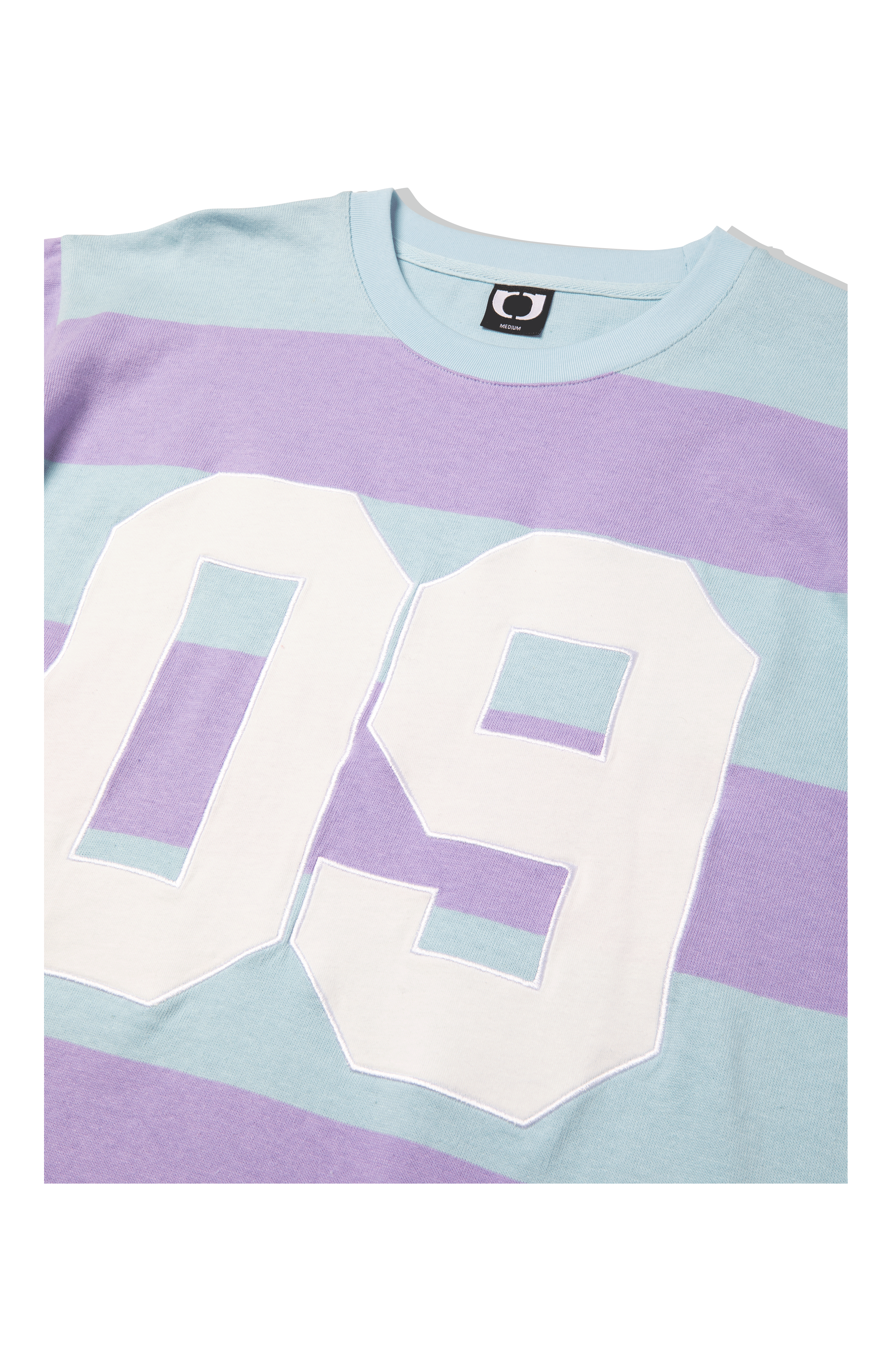 Striped "09" Tee.